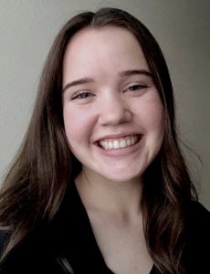 A woman smiling. 